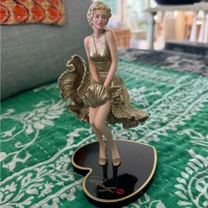 Marilyn Monroe Figurines (3) with gold dress and Black Base. Collectable!